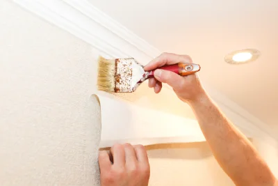 Pose de papier peint à Léobard — revêtements muraux et toiles de verre